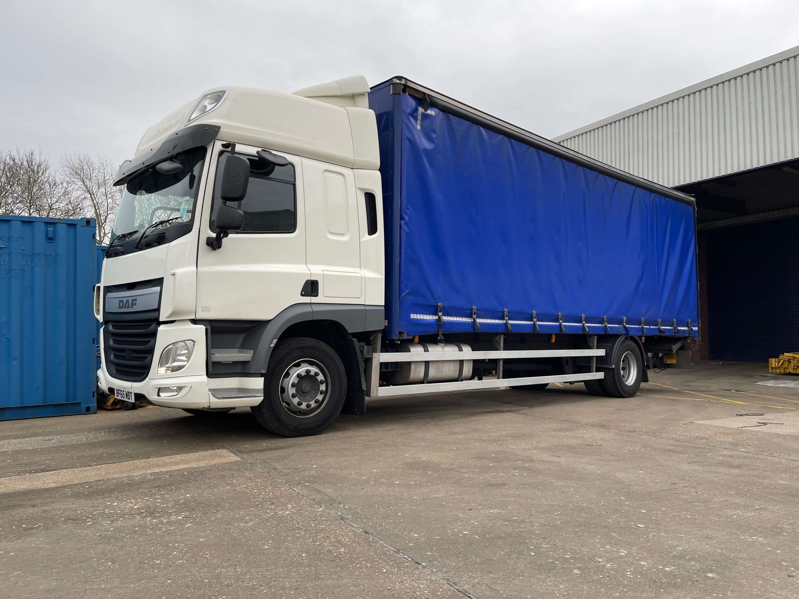 18 ton blue curtainsider tail lifted lorry